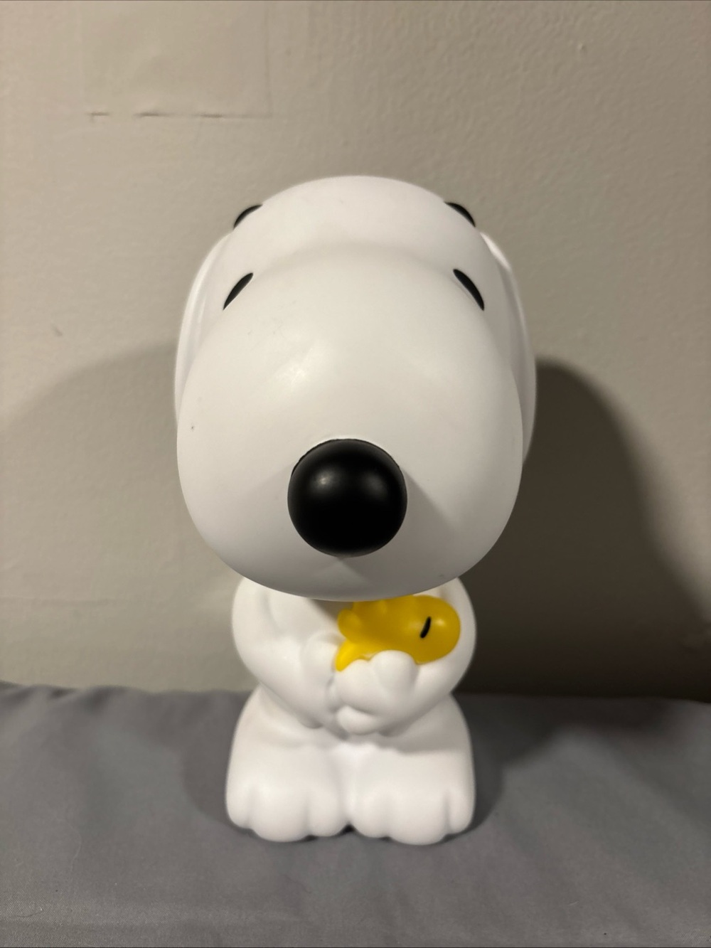 Peanuts Snoopy Figurine with Yellow Woodstock -plastic bank